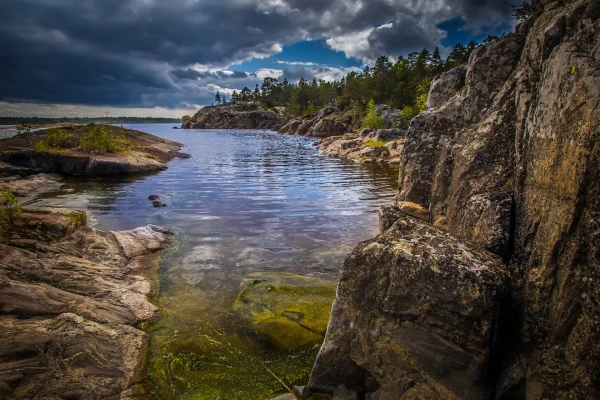 Rocky coast. Rocky coast of the island. Island with rocks. Karelia. Ladoga lake.
